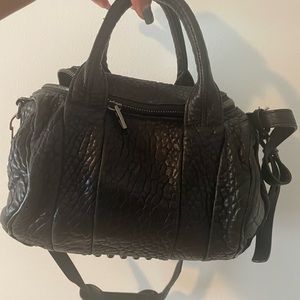 Alexander Wang Rockie Lambskin Leather Satchel Bag with silver studs.